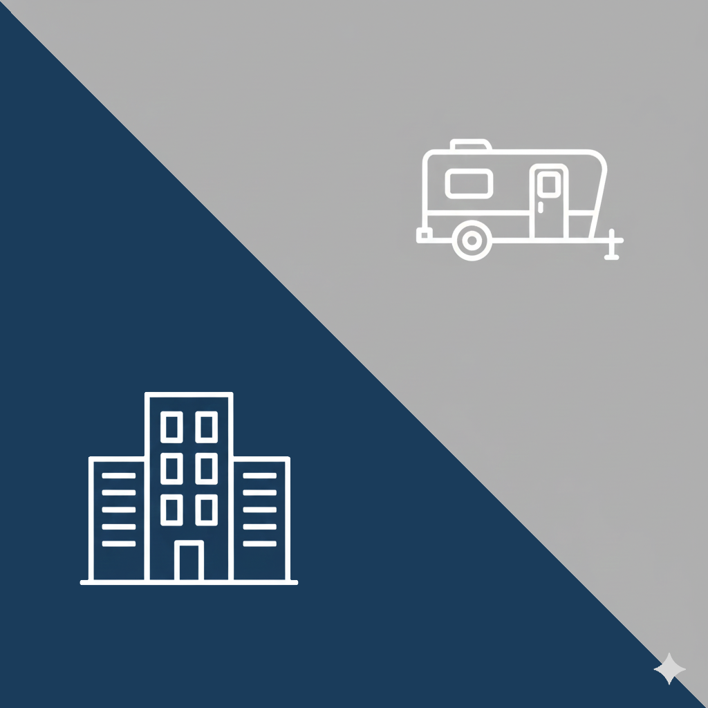 Inspections for Townhomes, Condo, and Modular Homes | At Ease Property Inspections A graphic split diagonally between dark blue and gray. The dark blue section contains a white line icon of a multi-story commercial or apartment building, and the gray section contains a white line icon of a travel trailer/RV. This image represents the wide range of commercial and specialized property types inspected by Erich Kamprath/At Ease Property Inspections in the North Okanagan.