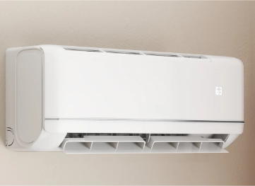 Indoor head unit of a ductless mini-split air conditioning system mounted high on a wall inside a modern home. The sleek, rectangular design features adjustable vents and a digital display, providing quiet, energy-efficient cooling and heating. This unit operates independently, allowing for zoned climate control. Regular cleaning of the filters and inspection ensures optimal air quality, performance, and longevity of the system. Erich with At Ease Inspections checks either the Heating or the AC function of these units to make sure the system is working correctly.